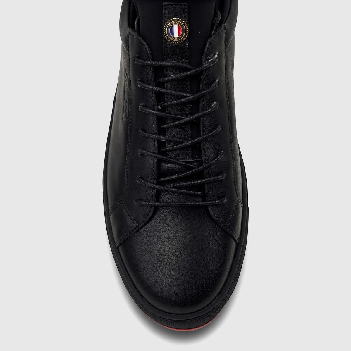 Bulletti Men's Black Leather Sneaker HASM-001, featuring a detailed front view of the laces and a round logo on the tongue.