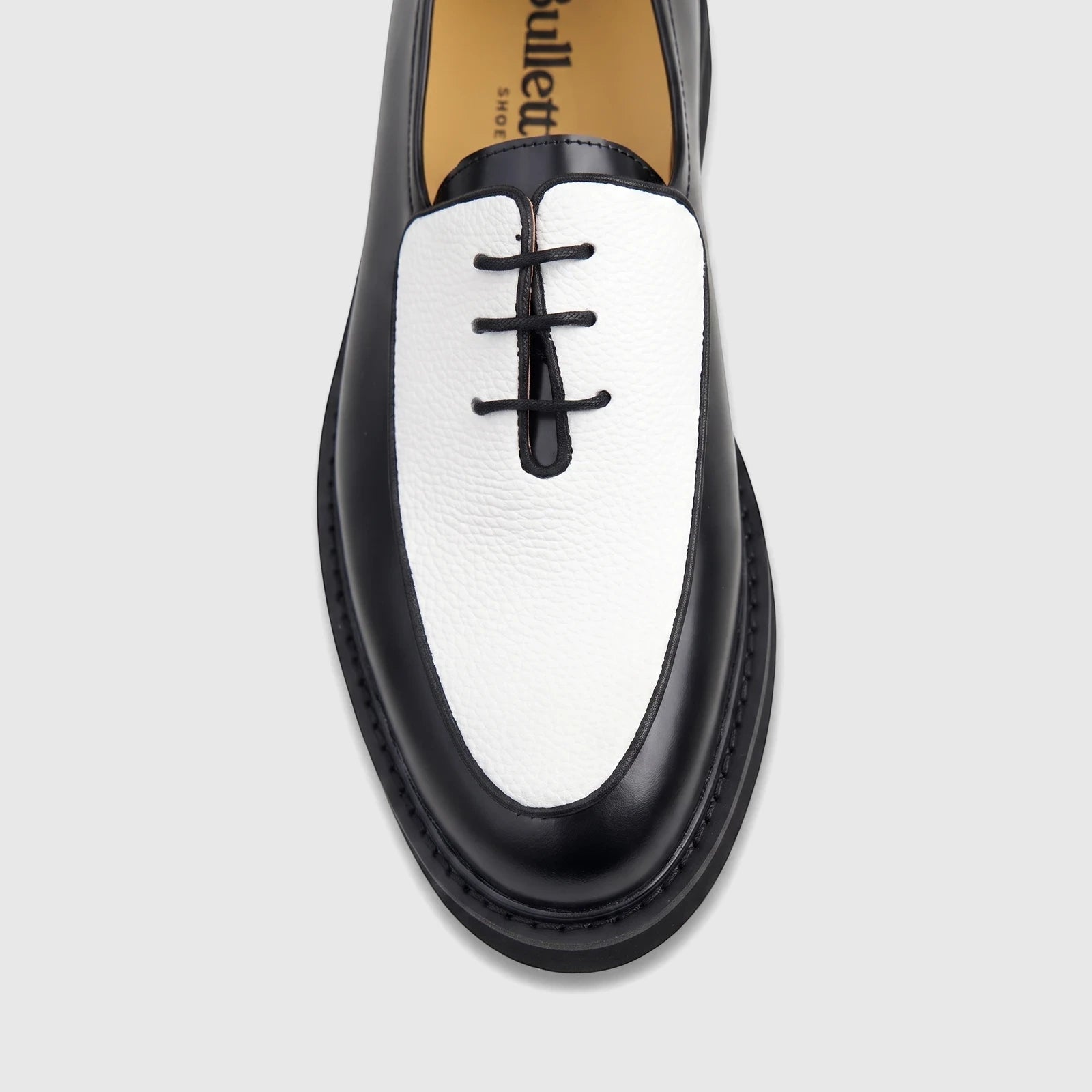 Bulletti Men's black and white leather chunky sole lace-up shoe, front top-down view.