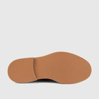 Underside view of a tan leather chunky sole from Bulletti Men's Lace Up Brogue 96-324 shoe, featuring a textured grip