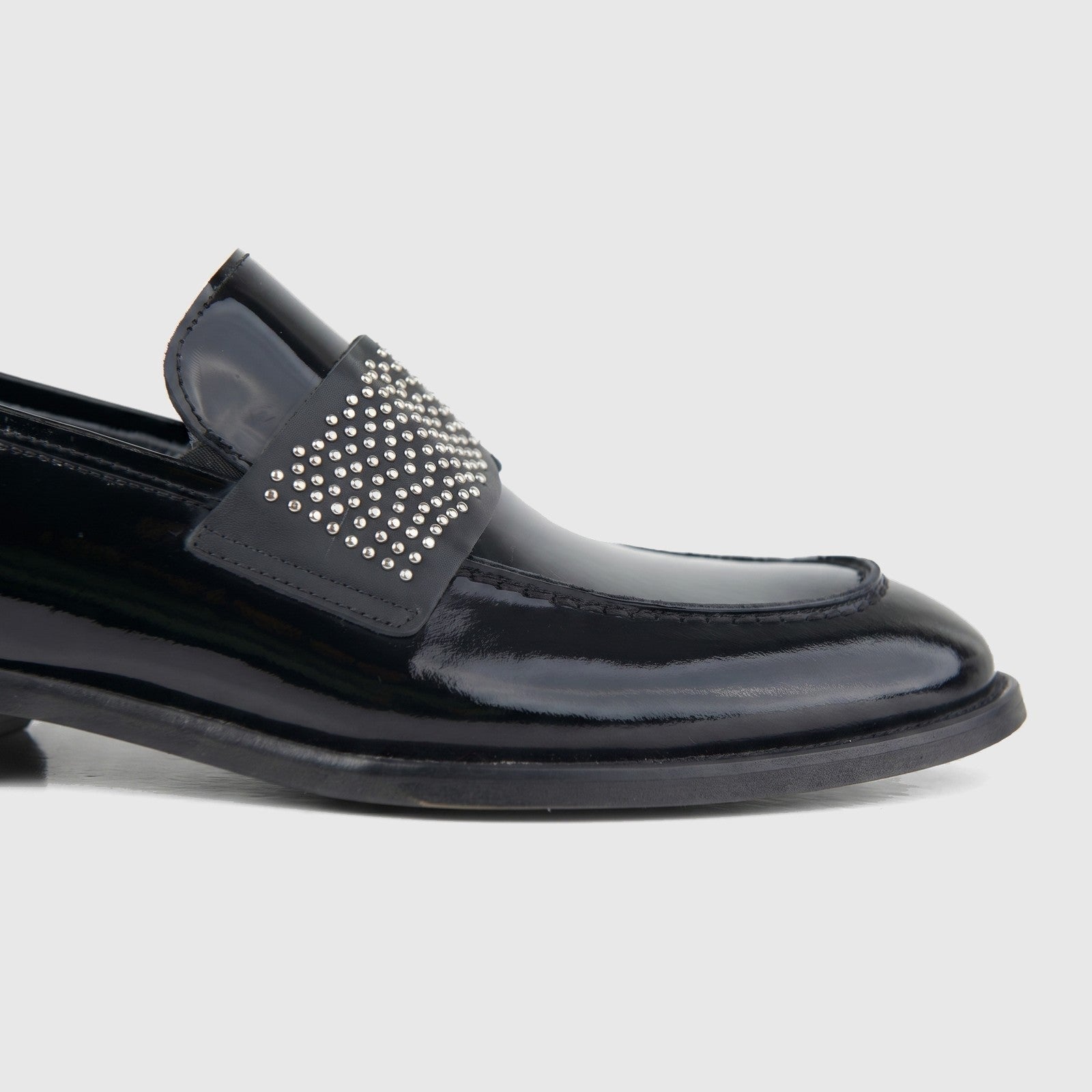 Bulletti men's leather dress slip on with studs 3-357 in black patent, side view showing studded strap.