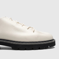 Off-white Bulletti men's leather chunky sole casual lace-up shoe with white laces and black sole, shown from the side.