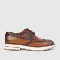 Bulletti Men's Tan Leather Chunky Sole Lace Up Brogue 96-324 shoe with intricate perforations, shown in a side view.