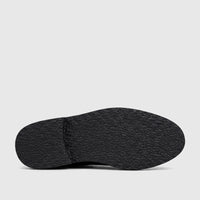 Bottom view of a Bulletti Men's Leather Chunky Sole Lace Up B7799M Odyssey shoe, featuring a textured black sole.
