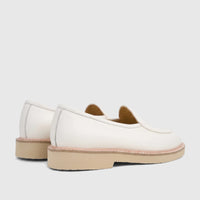 Pair of Bulletti Men's Leather Chunky Sole Loafers in off-white, shown from a side-rear view. The shoes feature visible