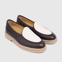 Pair of men's Bulletti leather loafers in mariner brown and off-white with chunky beige soles, viewed from an elevated angle.
