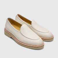 Pair of Bulletti Men's Leather Chunky Sole Loafers in off-white, presented at a slight angle.