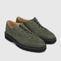 A pair of Bulletti Men's Leather Chunky Sole Casual Lace Up shoes in seawolf olive, with black lugged soles.