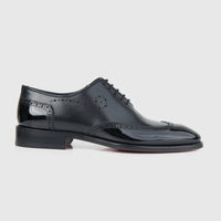 Bulletti men's black leather dress lace-up brogue shoe, side view with glossy finish and perforated detailing.