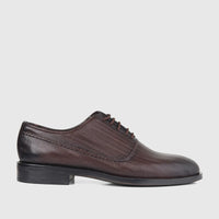 Bulletti Men's Leather Dress Lace Up shoe in brown, featuring a distinctive wavy embossed pattern, captured from a side view.