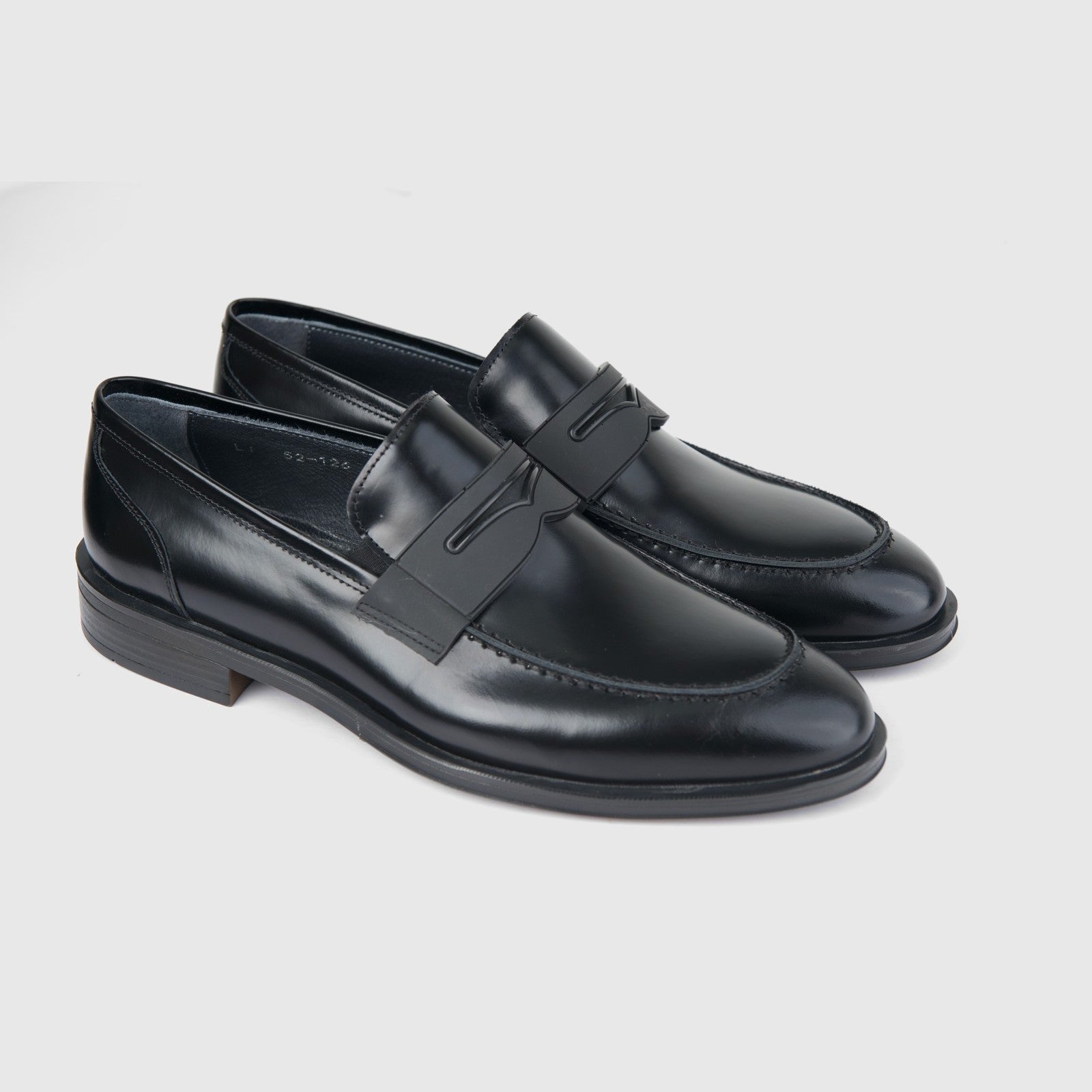 Bulletti Men's Leather Dress Slip On 52-126 in black hi-shine leather, pair of loafers shown in side view.