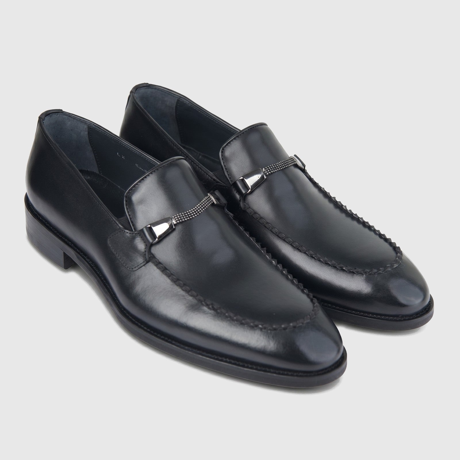 Bulletti men's leather dress slip on loafers in black with metal bit detail, shown as a pair angled view