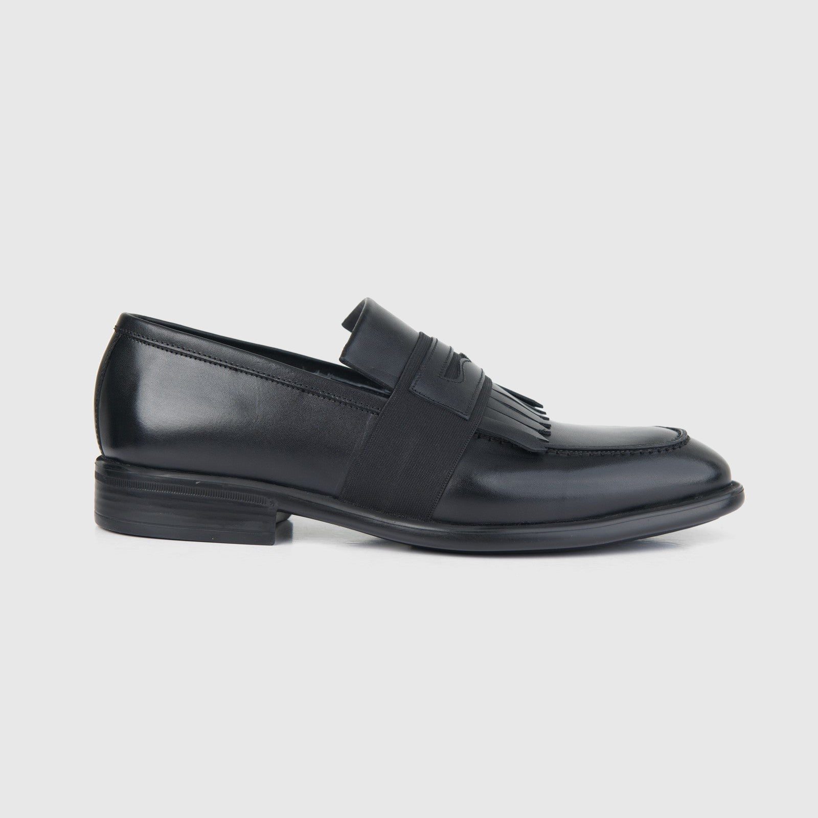 Bulletti Men's Leather Dress Slip On With Fringe 4-162 in black, leather loafer shown in side view with fringe detail.