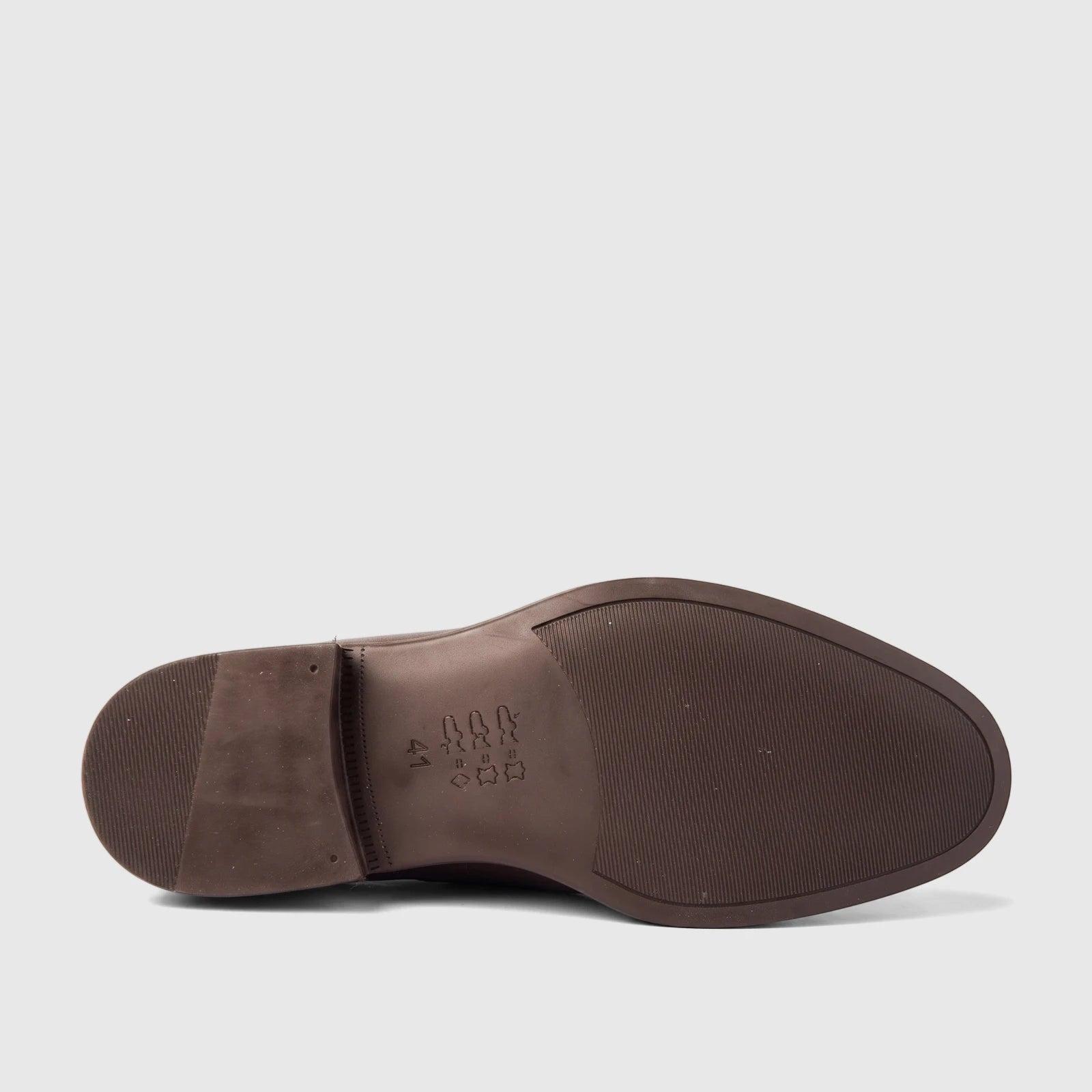 Bottom view of a Bulletti Men's Leather Dress Slip On With Tassel shoe sole in brown, featuring a textured anti-slip design.