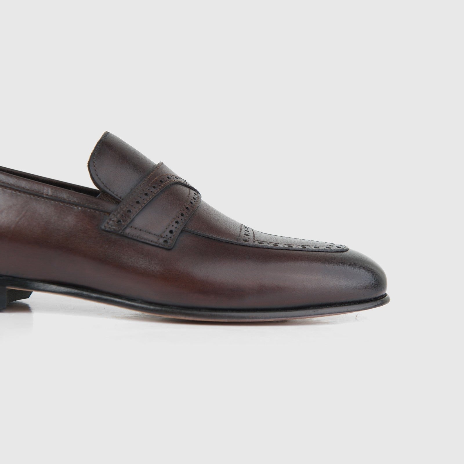 Bulletti Men's Leather Dress Slip On 140-22 in brown leather, side view loafer with apron toe and perforated strap.