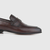 Bulletti Men's Leather Dress Slip On 140-22 in brown leather, side view loafer with apron toe and perforated strap.