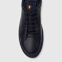 Top-down view of a Bulletti Men's Leather Sneaker in dark blue, featuring laces and a brand badge on the tongue.