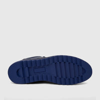 Bottom view of a Bulletti Men's Leather Sneaker Dark Blue HASM-001, showcasing the chunky, ridged blue sole.