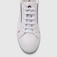 Close-up front view of a white Bulletti men's leather sneaker with white laces and subtle side stripes.