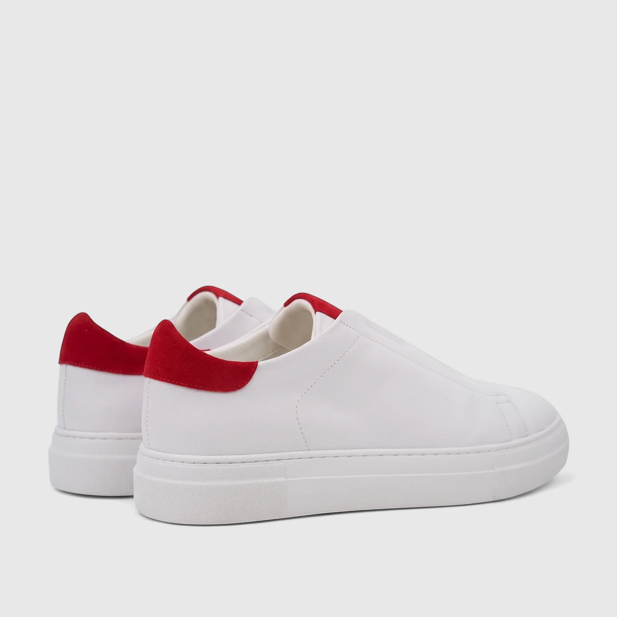 Bulletti Men's Leather Sneakers, style HASM-004, featuring a white leather upper, red suede heel tab, and white sole, shown