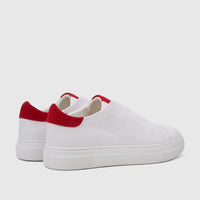 Bulletti Men's Leather Sneakers, style HASM-004, featuring a white leather upper, red suede heel tab, and white sole, shown