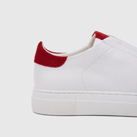 Bulletti Men's Leather Sneaker in white with a red heel accent, shown from a side perspective.