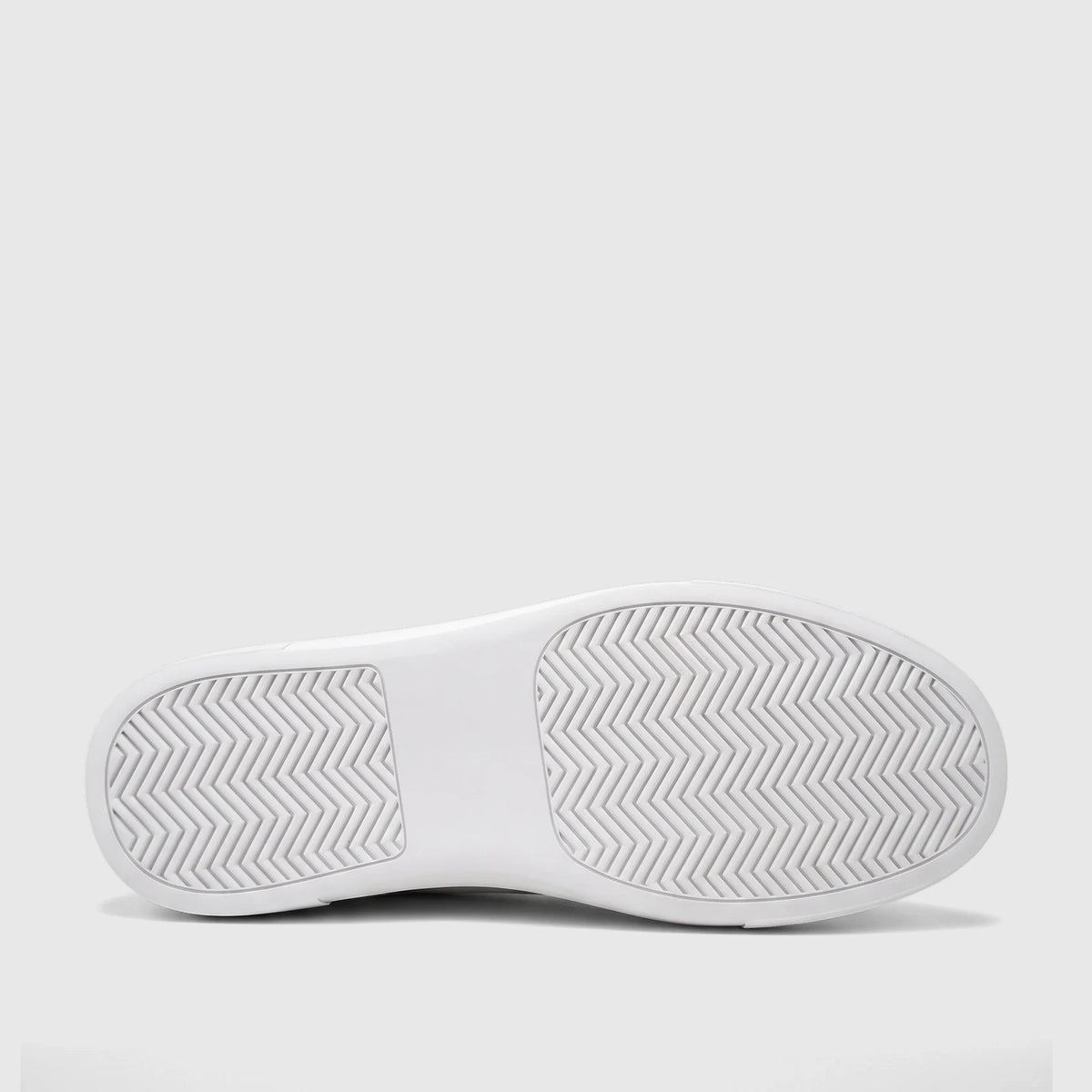 Bottom view of a Bulletti Men's Leather Sneaker in white, showcasing the textured rubber sole with a zigzag pattern.