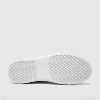 Bottom view of a Bulletti Men's Leather Sneaker in white, showcasing the textured rubber sole with a zigzag pattern.