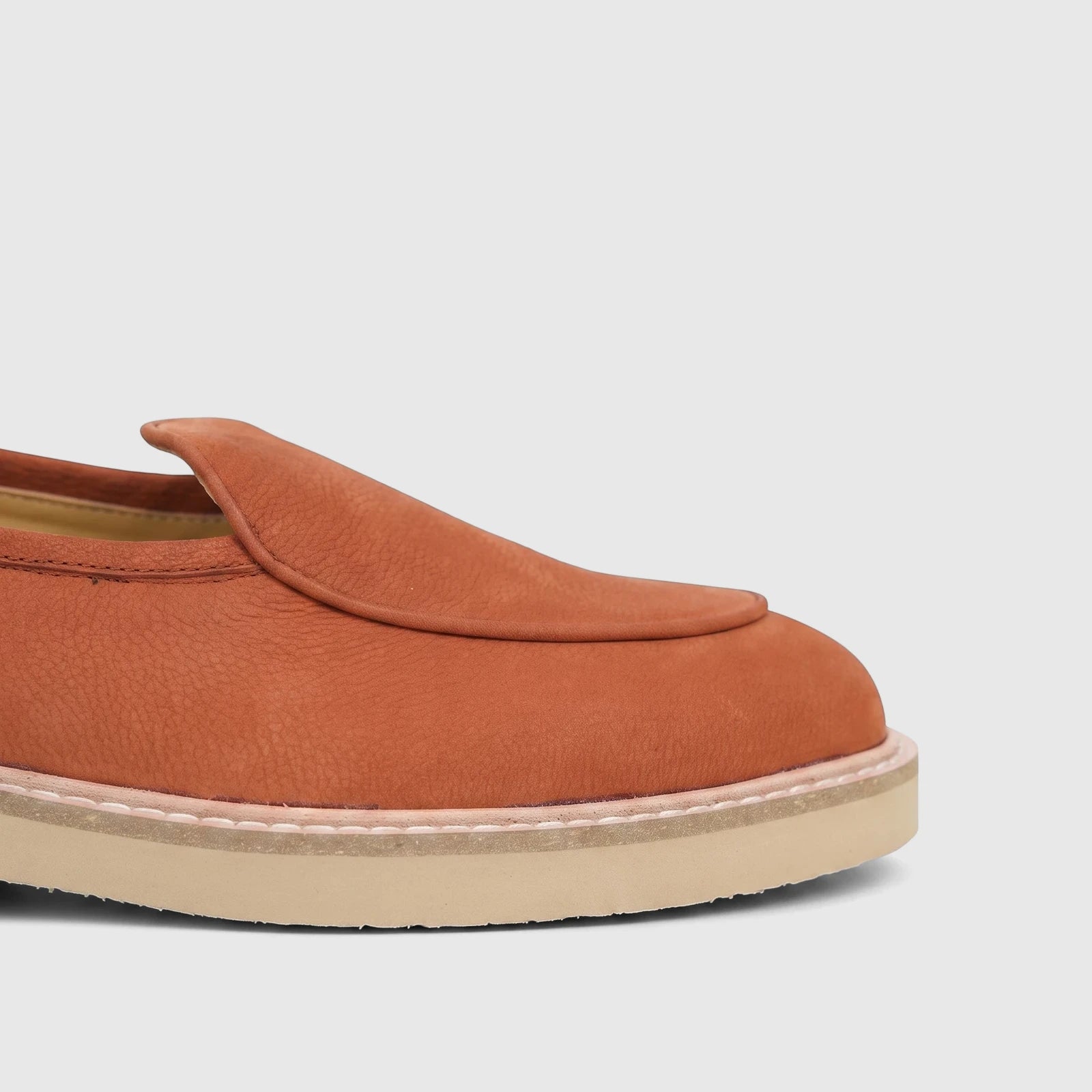 Bulletti Men's Mariner Orange leather chunky sole loafer, side view showing pebbled texture and light sole.