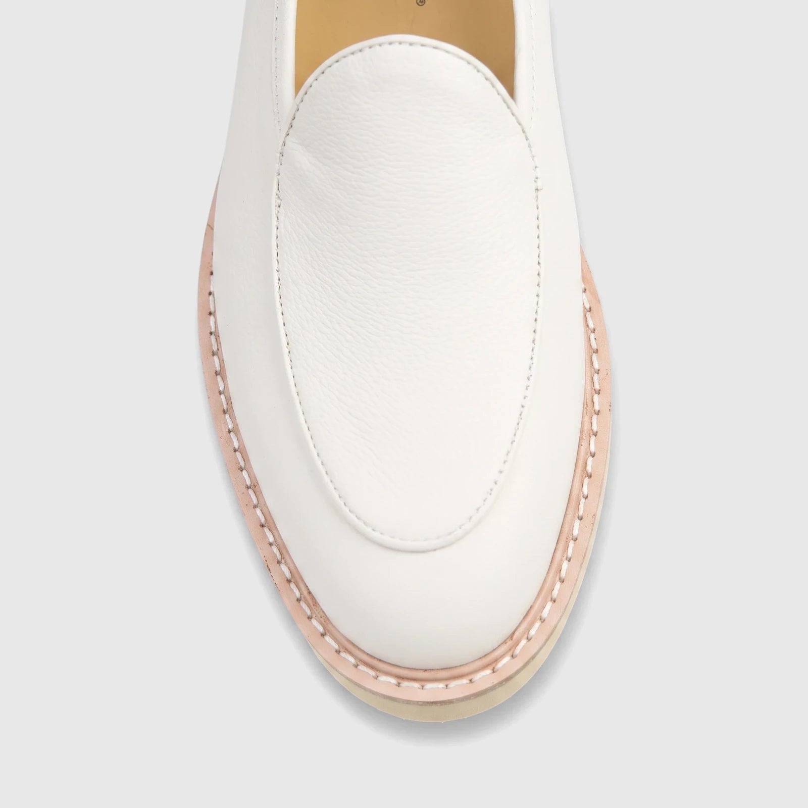 Bulletti Men's Leather Chunky Sole Loafer in off-white, showing the toe and stitched sole from a top-down view.