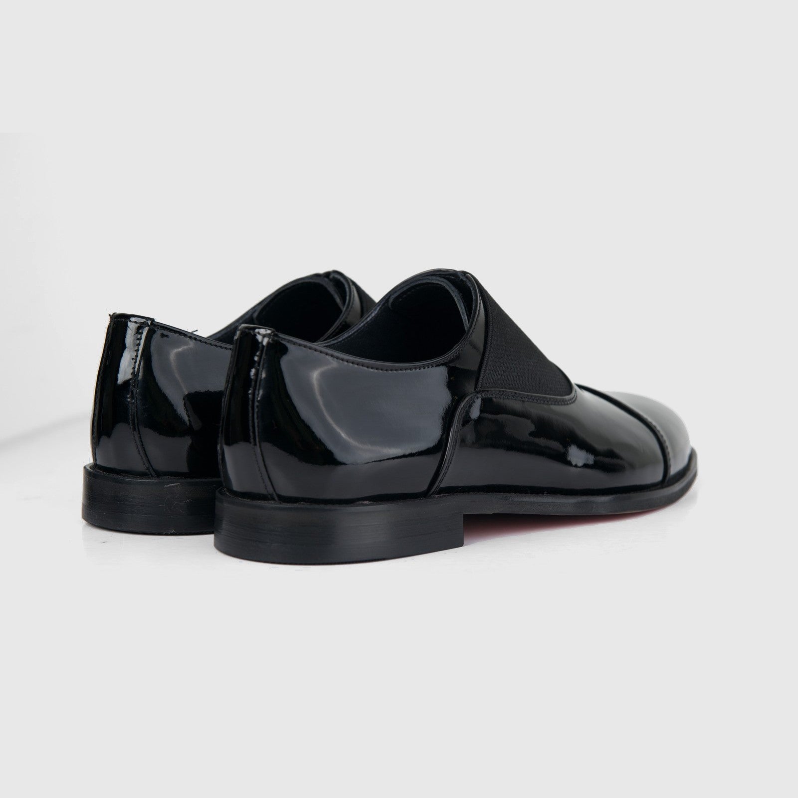 Bulletti Men's Leather Dress Slip On 24-397 black patent shoes with glossy finish, rear side view of the pair.