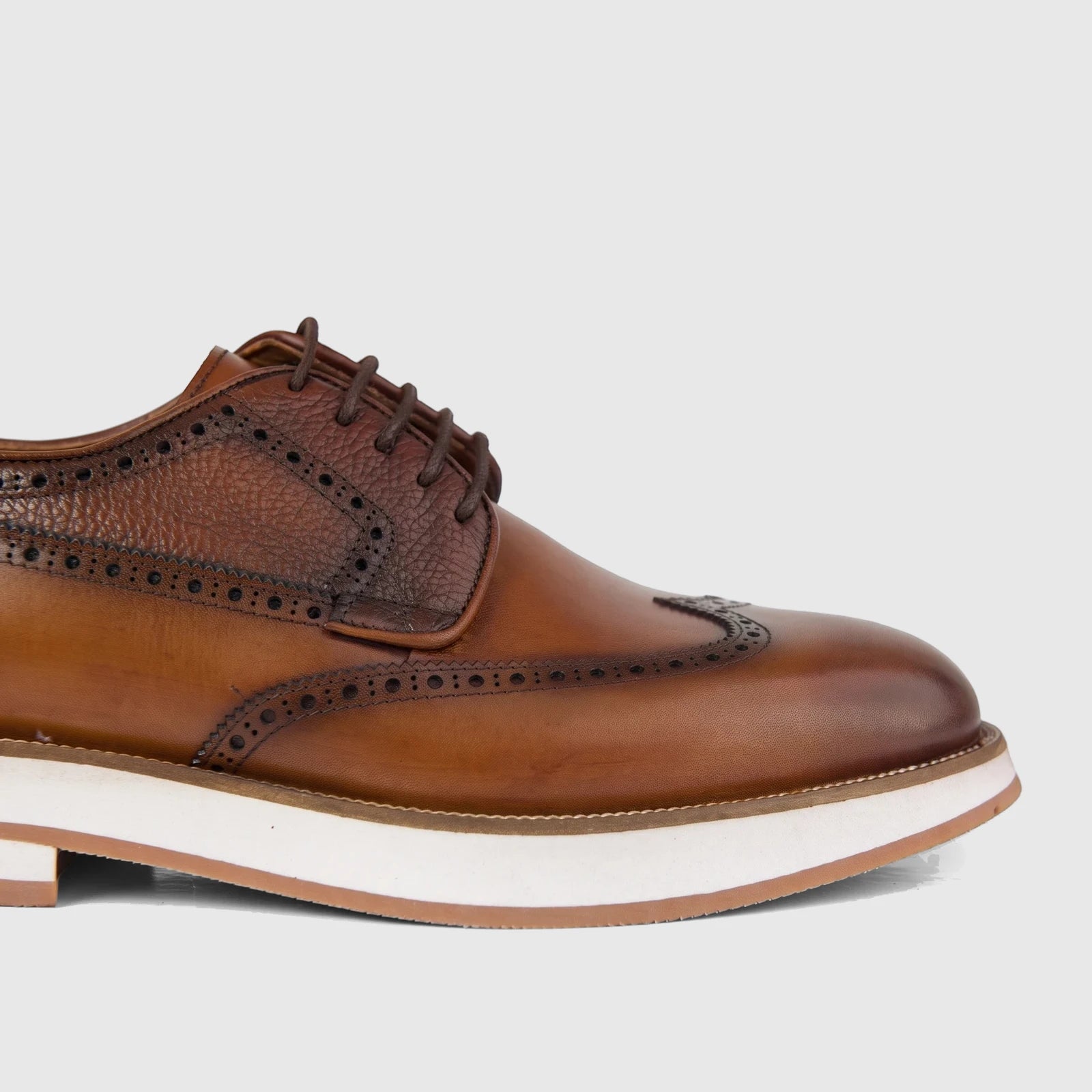 Bulletti Men's tan leather chunky sole lace-up brogue shoe with detailed perforations and two-tone texture, viewed from the