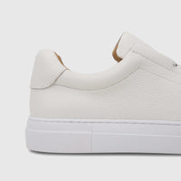 White Bulletti Men's Leather Sneaker, model HASM-006, captured in a detailed side view. The shoe features fine stitching and