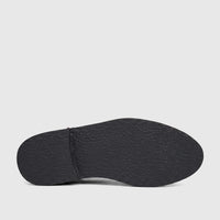 Bottom view of a Bulletti Unisex Chunky Sole Sandal, showing the textured black rubber sole.
