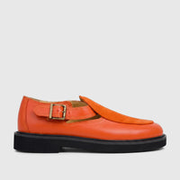 Bulletti Unisex orange leather chunky sole sandal with suede detailing and a brass buckle, shown in a side view.