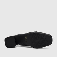 View of the black Capelli Rossi block heel court shoe sole, displaying brand name, size 37, and a geometric traction pattern.