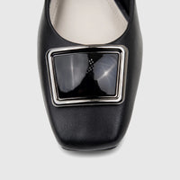 Capelli Rossi black leather block heel court shoe with a square toe and silver buckle detail on the vamp, front view.