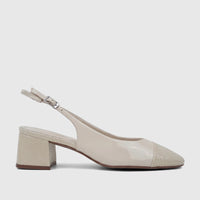 Bone leather Capelli Rossi slingback block heel court shoe, featuring a patent finish, textured toe, and a silver buckle,