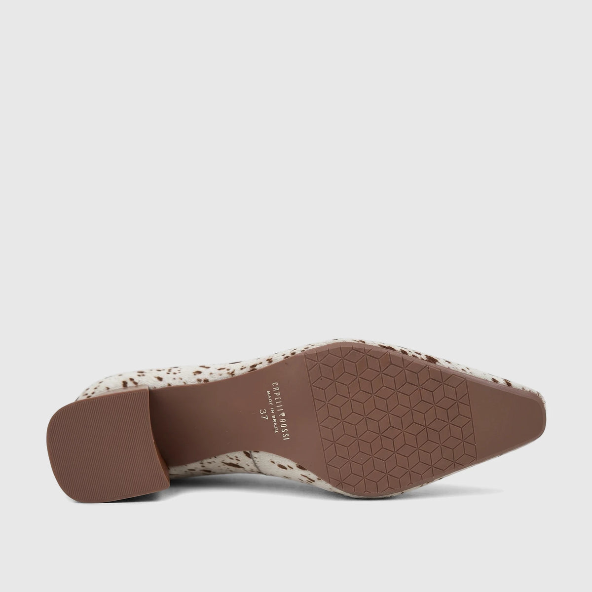Bottom view of a Capelli Rossi white and brown cow print leather block heel court shoe, showcasing the textured sole and