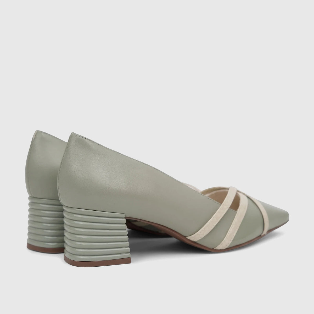 Capelli Rossi leather ladies block heel court shoe in green with beige criss-cross straps and ribbed heels, side view.