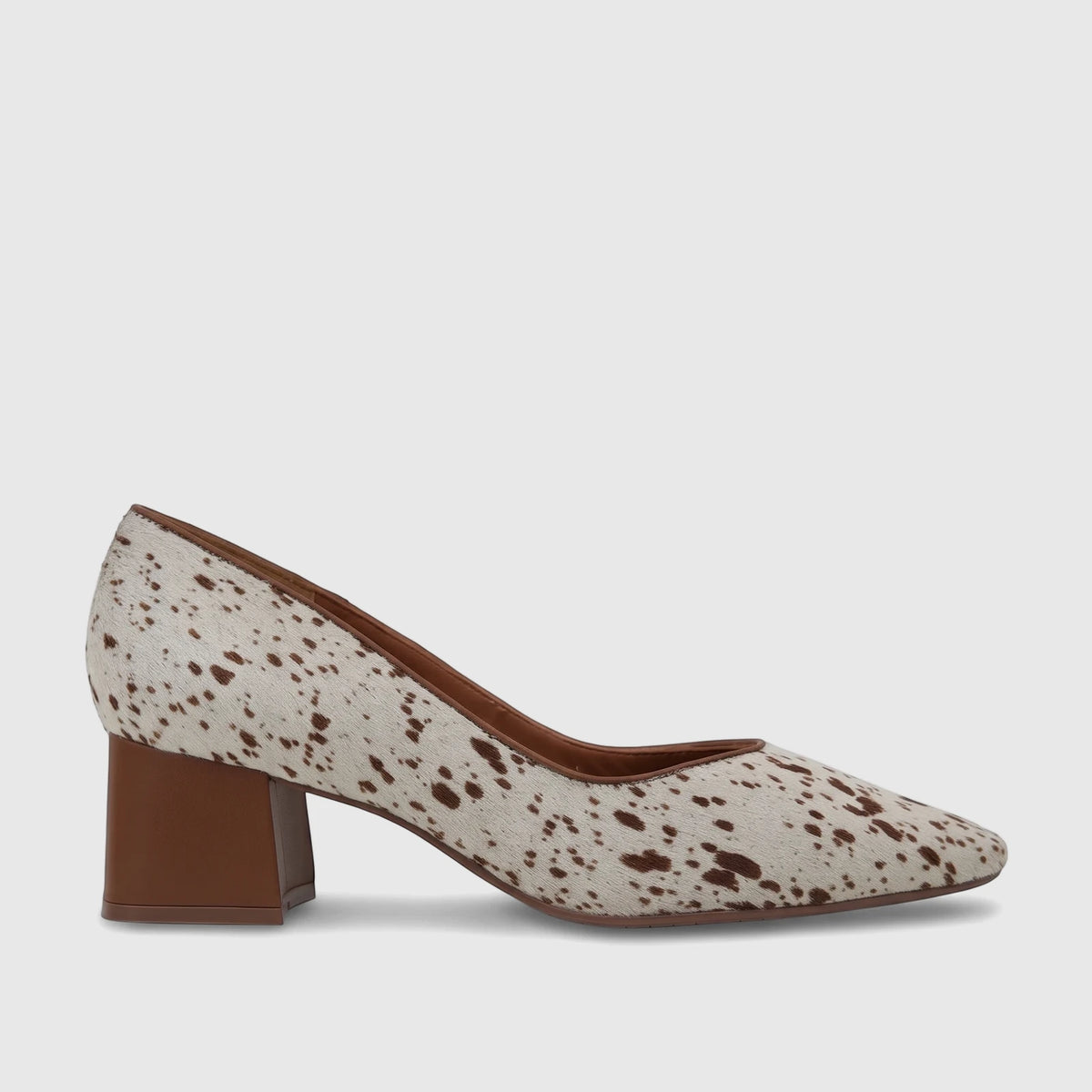 Capelli Rossi leather ladies block heel court shoe in white and brown cow print, featuring a sturdy brown block heel and