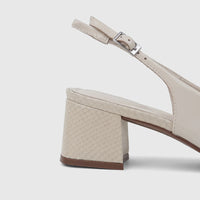 Side view of a Capelli Rossi Leather Ladies Slingback Block Heel Court shoe in bone, featuring a patent leather upper and a