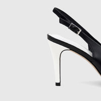 Close-up of a stylish Capelli Rossi Leather Ladies Slingback Court 11985 in black, featuring a white heel and silver buckle