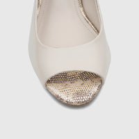Close-up view of a Capelli Rossi ladies' slingback block heel peep toe shoe in bone leather with a distinctive gold