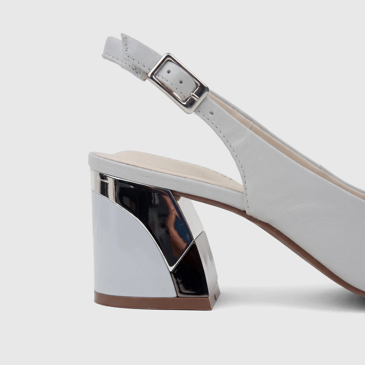 Capelli Rossi powder blue leather slingback court shoe with a chunky block heel featuring silver-toned accents, side view.
