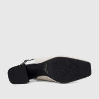Underside view of a Capelli Rossi leather ladies' slingback block heel court shoe in bone white with a black sole.