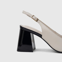 Capelli Rossi leather slingback block heel court shoe in bone, featuring a black heel and a gold buckle.