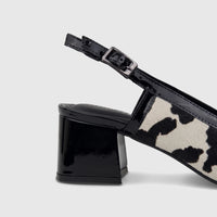 Capelli Rossi leather slingback court shoes with cow hair print, black patent block heel, and adjustable strap.