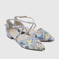 Pair of Capelli Rossi women's light blue leather pumps with colorful floral print and crossover ankle straps.
