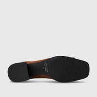 Tan Capelli Rossi leather ladies block heel court shoe, showcasing the black rubber sole with 'Made in Brazil 37' branding.