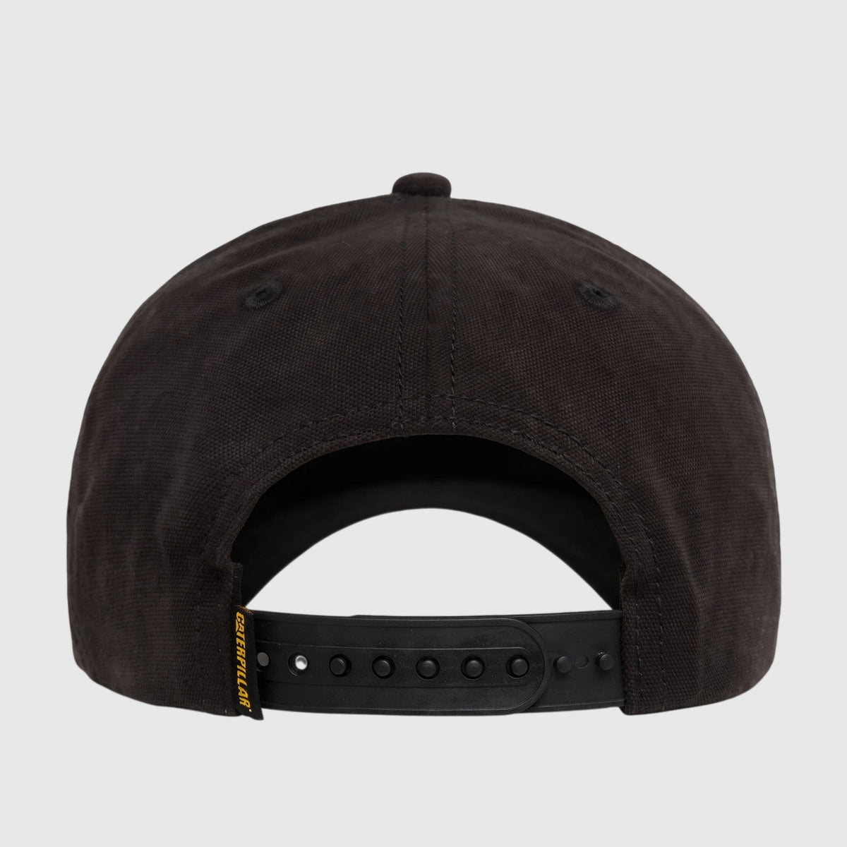 Black Cat Design Mark Aop Cap with a snapback closure, shown from the back, featuring a yellow Caterpillar brand tag.